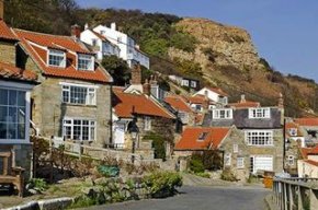 A welcoming campsite above the quiet coastal village of Runswick Bay where a sheltered beach and excellent coastal walks back onto the North York Moors National Park.