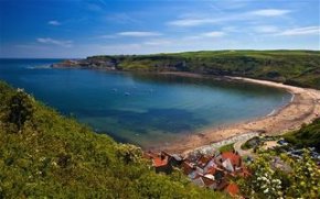 The quiet coastal village of Runswick Bay where a sheltered beach and excellent coastal walks back onto the North York Moors National Park. The beach is just a 10-15 minute walk from the park